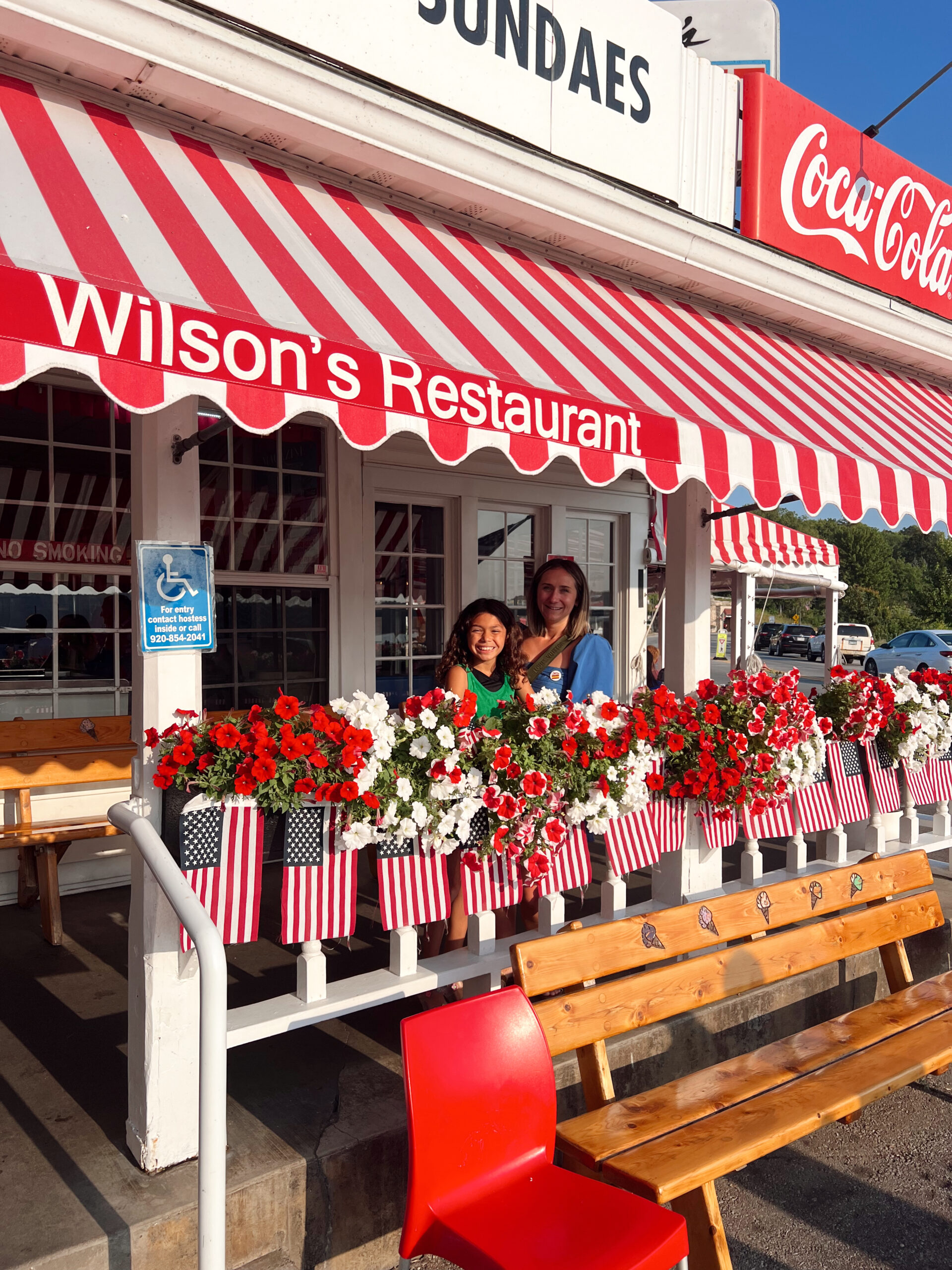 standing in front of ice cream parlor